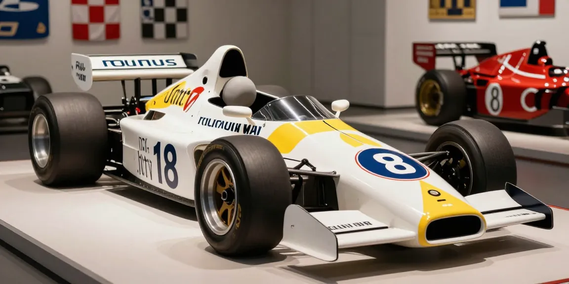 Mobil Formula Satu Lotus 88 yang ikonik dalam pameran, memperlihatkan desain dan sejarah balap yang mengesankan.